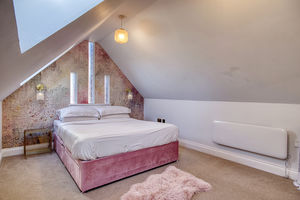 Bedroom One- click for photo gallery